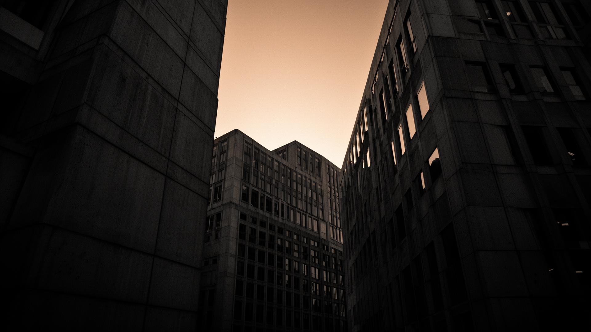 Brutalist corporate architecture at dusk